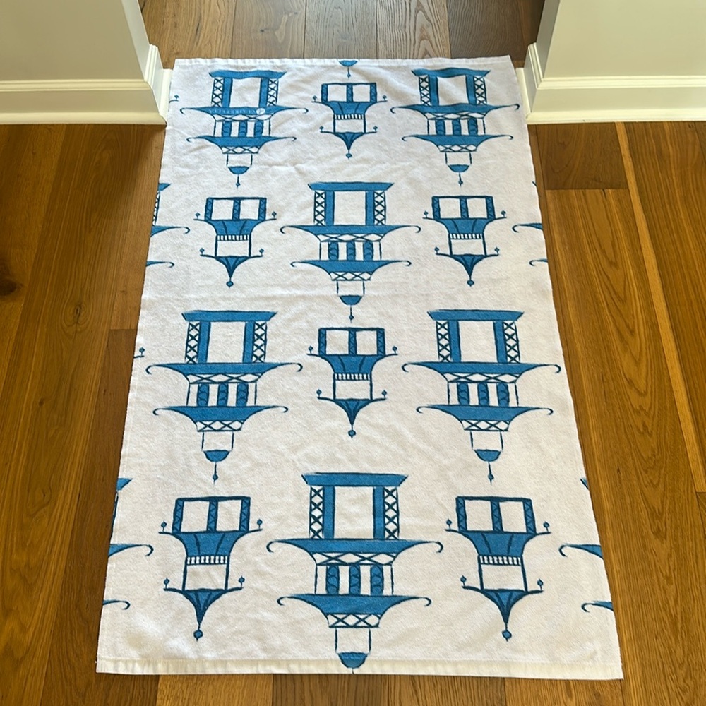 Blue and white beach towel. Used once. Like new.